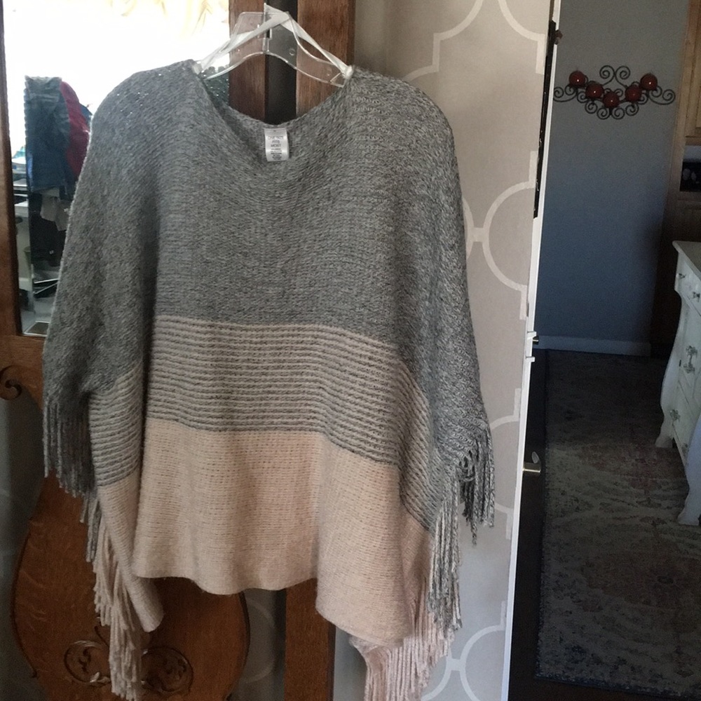 Poncho with arm holes